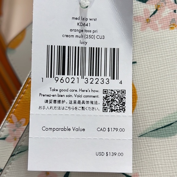 Kate Spade Lucy Orange Toss Printed Medium L-Zip Wristlet
Cream Multi
NWT - Picture 11 of 16